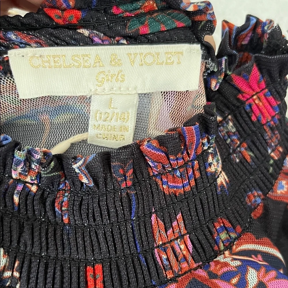 Chelsea & Violet Black Floral Smocked Peplum Blouse
